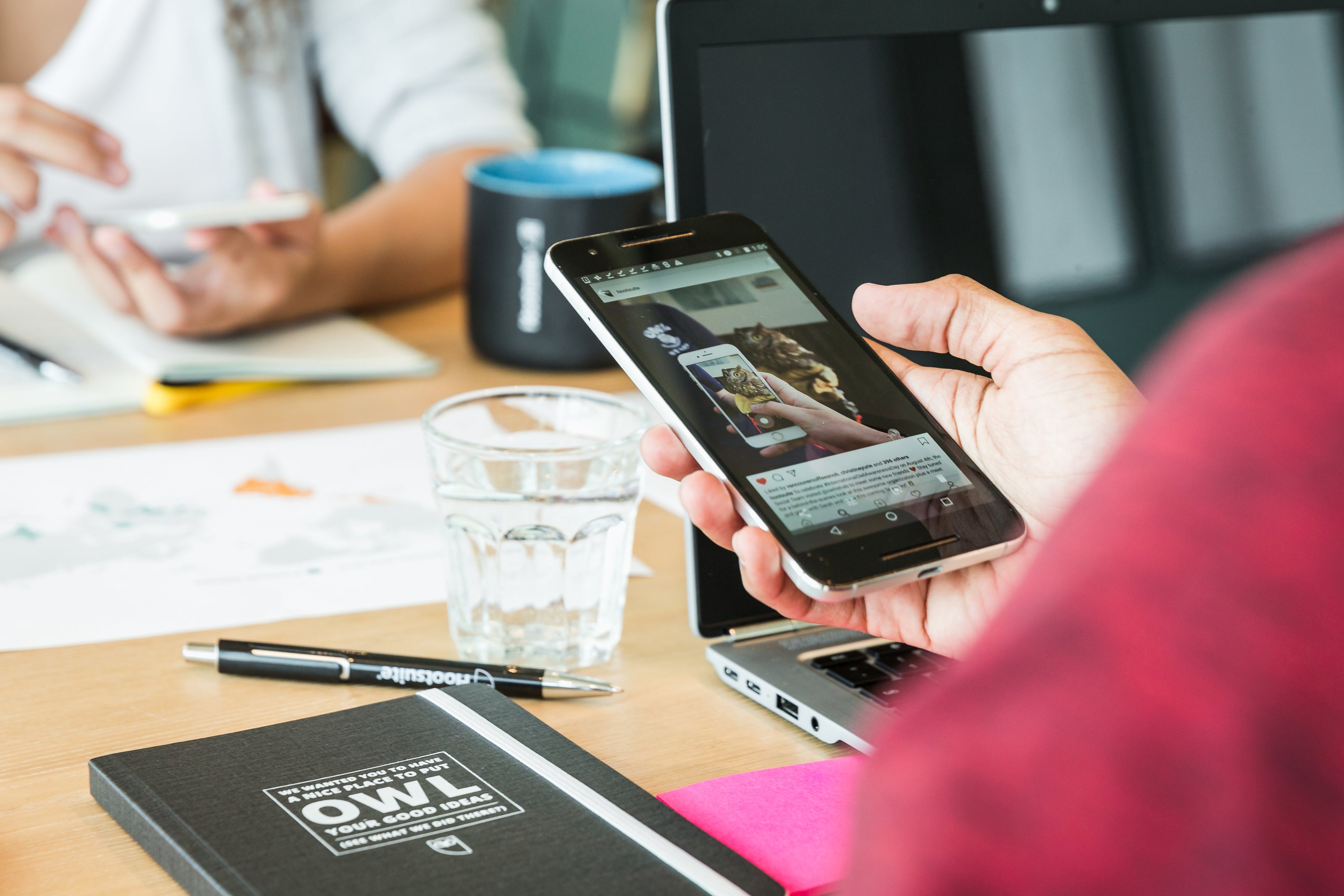 holding-a-smartphone-at-work